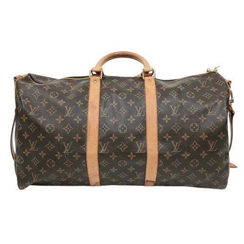 197 - A Brown Louis Vuitton Monogram Keepall 50 Travel Bag. Brown monogram coated canvas exterior with gol... 