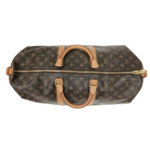 197 - A Brown Louis Vuitton Monogram Keepall 50 Travel Bag. Brown monogram coated canvas exterior with gol... 