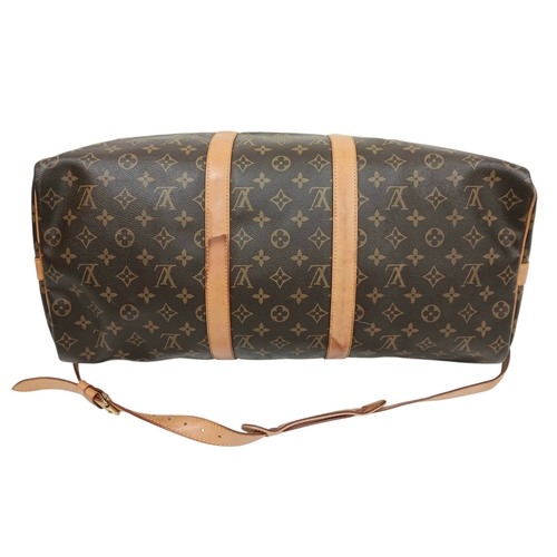 197 - A Brown Louis Vuitton Monogram Keepall 50 Travel Bag. Brown monogram coated canvas exterior with gol... 