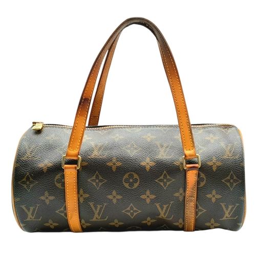 204 - A Louis Vuitton Monogram Papillon 26 Hand Bag. Crafted in brown LV monogram coated canvas with light... 