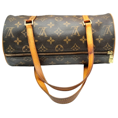 204 - A Louis Vuitton Monogram Papillon 26 Hand Bag. Crafted in brown LV monogram coated canvas with light... 