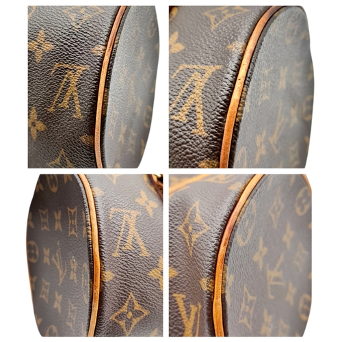 204 - A Louis Vuitton Monogram Papillon 26 Hand Bag. Crafted in brown LV monogram coated canvas with light... 