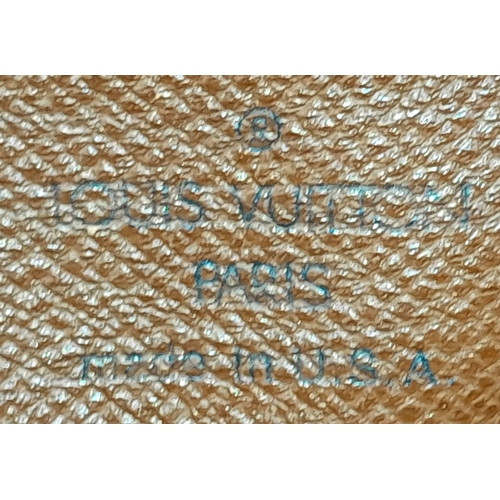 204 - A Louis Vuitton Monogram Papillon 26 Hand Bag. Crafted in brown LV monogram coated canvas with light... 