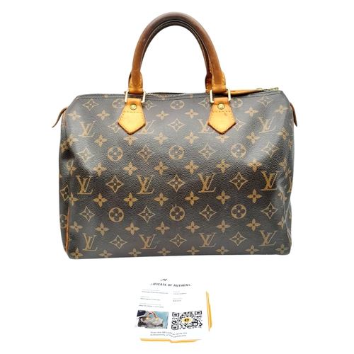 225 - A Brown Louis Vuitton Monogram Speedy 30 Bag. Brown monogram coated canvas exterior with gold-toned ... 