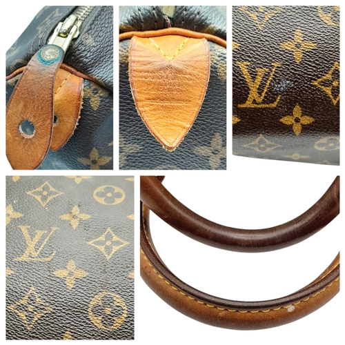 225 - A Brown Louis Vuitton Monogram Speedy 30 Bag. Brown monogram coated canvas exterior with gold-toned ... 