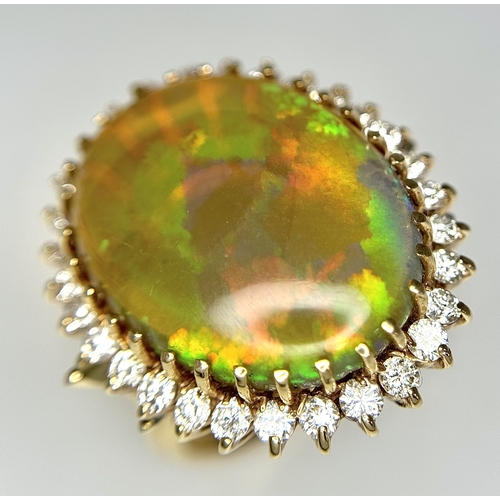 23 - A Stunning Large Opal and Diamond Dress Ring set in 18K Gold. A golden oval cut opal c. 20ct with fa... 