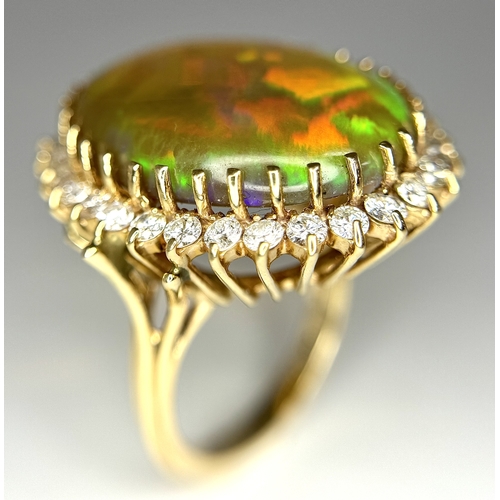 23 - A Stunning Large Opal and Diamond Dress Ring set in 18K Gold. A golden oval cut opal c. 20ct with fa... 