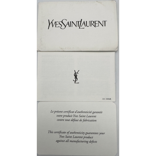 275 - A Yves Saint Laurent Roady Hobo Bag. Burgundy leather exterior with gold-tone hardware and a single ... 