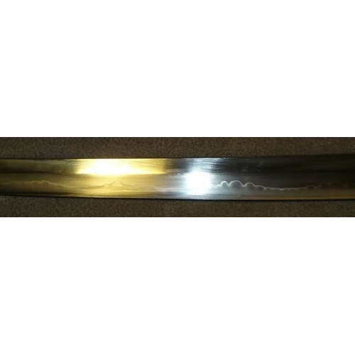 456 - A WWII Japanese Sword with Silver Mon and Gold Coloured Tassel. PRICED TO SELL! A WWII Japanese Army... 