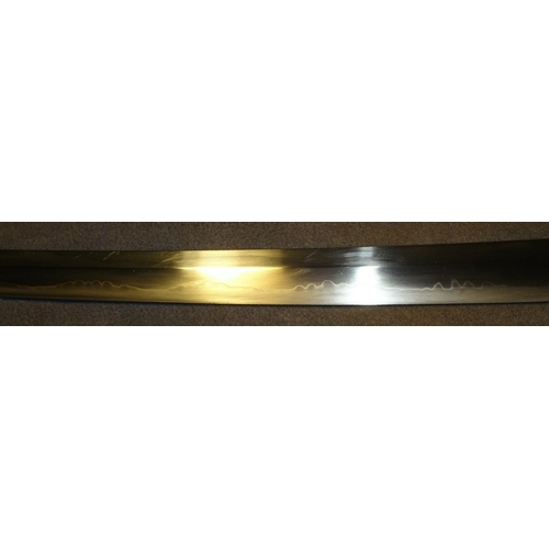 456 - A WWII Japanese Sword with Silver Mon and Gold Coloured Tassel. PRICED TO SELL! A WWII Japanese Army... 