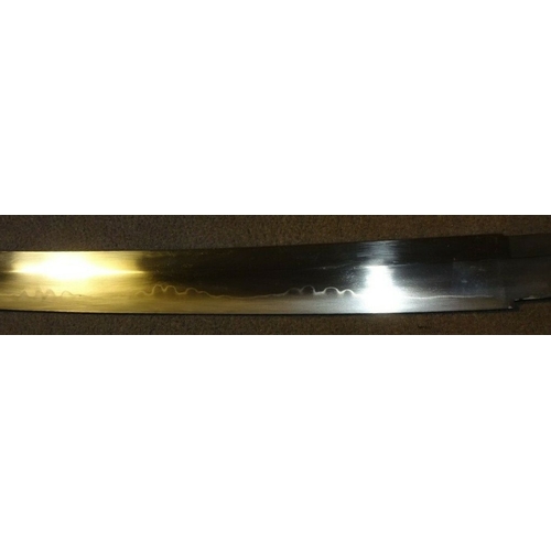 456 - A WWII Japanese Sword with Silver Mon and Gold Coloured Tassel. PRICED TO SELL! A WWII Japanese Army... 