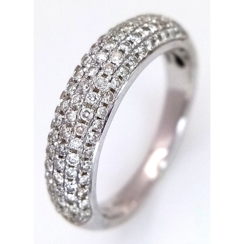 An 18K White Gold Diamond Pave Ring. Size J 1/2. 3.53g. Two small ...