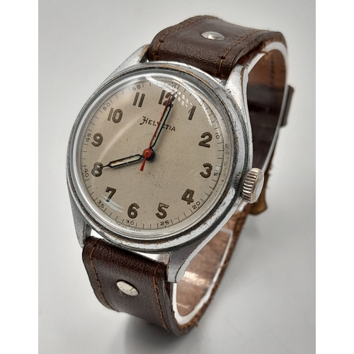 124 - WW2 German Africa Corps Helvetia Wrist Watch. Marked DI & H for issue to the Italian Army. Works wel... 