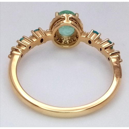 177 - An 18K Yellow Gold Green Gemstone Ring with Diamond and Topaz accents. Size P. 3.1g total weight. Re... 