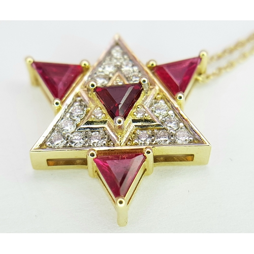 184 - A 14K Gold Ruby and Diamond Fancy Star of David Pendant on a 14K Gold Necklace. 0.51ctw of diamonds.... 