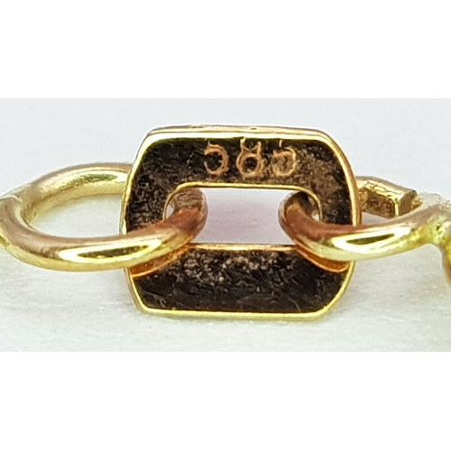 184 - A 14K Gold Ruby and Diamond Fancy Star of David Pendant on a 14K Gold Necklace. 0.51ctw of diamonds.... 