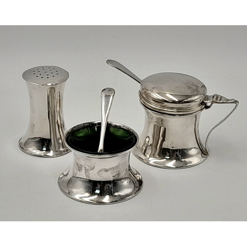 201 - AN ANTIQUE SILVER CONDIMENT SET DATED 1911 COMPRISING OF 2 SILVER SALTS WITH SPOONS AND GLASS LINERS... 