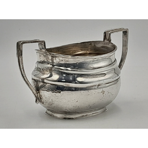 229 - A ANTIQUE SILVER SUGAR BOWL DATED 1916 MADE IN SHEFFIELD .     115.6gms