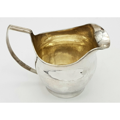 236 - AN ANTIQUE EARLY GEORGIAN SILVER CREAMER (CIRCA 1724).    99.6gms