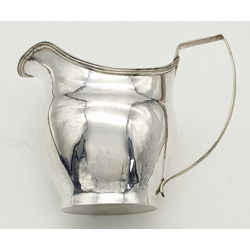 236 - AN ANTIQUE EARLY GEORGIAN SILVER CREAMER (CIRCA 1724).    99.6gms