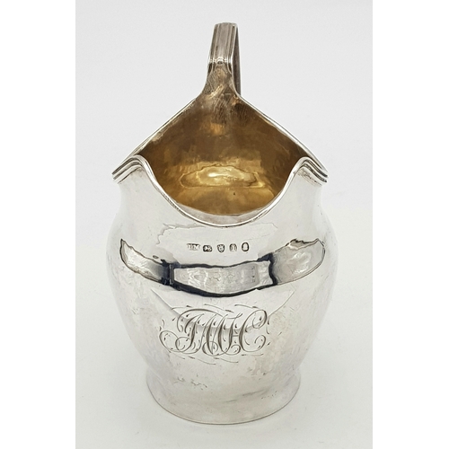 236 - AN ANTIQUE EARLY GEORGIAN SILVER CREAMER (CIRCA 1724).    99.6gms