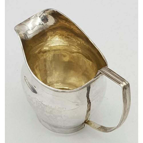 236 - AN ANTIQUE EARLY GEORGIAN SILVER CREAMER (CIRCA 1724).    99.6gms