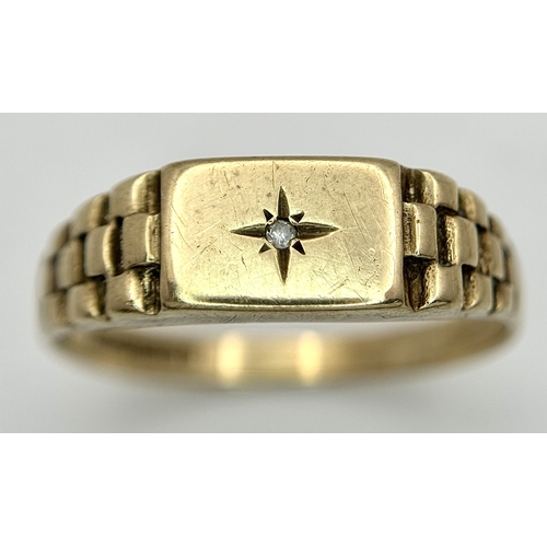 243 - A 9K GOLD RING WITH SMALL DIAMOND .     2.3gms    size T