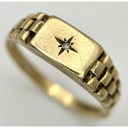 243 - A 9K GOLD RING WITH SMALL DIAMOND .     2.3gms    size T
