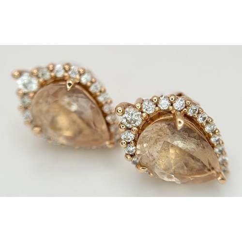 128 - A Pair of 14K Rose Gold Citrine and Diamond Stud Earrings - Both having a 2ct pear cut citrine with ... 