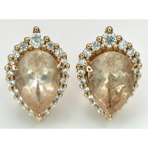 128 - A Pair of 14K Rose Gold Citrine and Diamond Stud Earrings - Both having a 2ct pear cut citrine with ... 