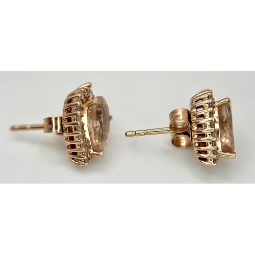 128 - A Pair of 14K Rose Gold Citrine and Diamond Stud Earrings - Both having a 2ct pear cut citrine with ... 