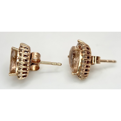 128 - A Pair of 14K Rose Gold Citrine and Diamond Stud Earrings - Both having a 2ct pear cut citrine with ... 