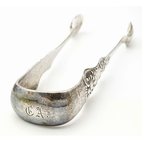 161 - A Magnificent Pair of Large Antique SCOTTISH SILVER TONGS. Beautiful Heavy Decoration to arms and Bo... 