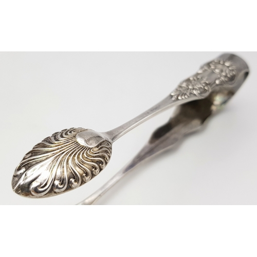 161 - A Magnificent Pair of Large Antique SCOTTISH SILVER TONGS. Beautiful Heavy Decoration to arms and Bo... 
