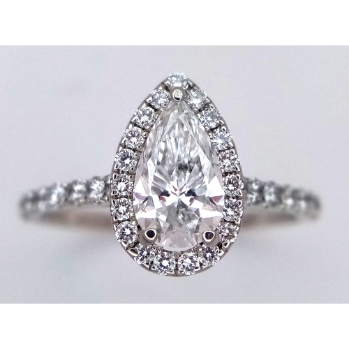 191 - A Platinum and Lab Diamond Dress Ring. 1ct pear brilliant cut diamond having D colour with VS2 clari... 