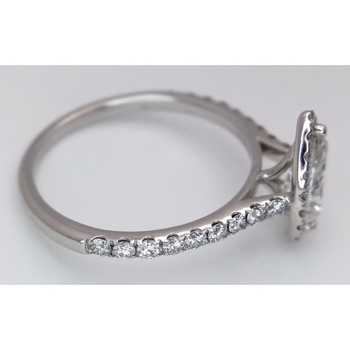 191 - A Platinum and Lab Diamond Dress Ring. 1ct pear brilliant cut diamond having D colour with VS2 clari... 