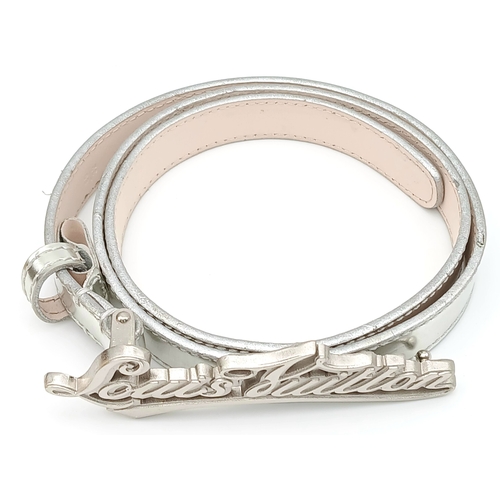 380 - A Louis Vuitton Silver Cursive Script Belt, featuring a metallic monogram buckle. Approximately 93.5... 