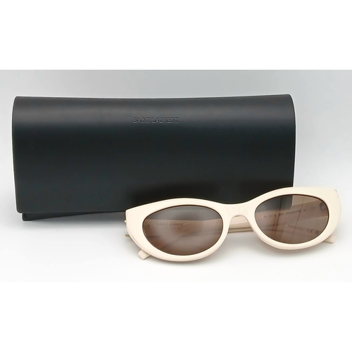 416 - A Pair of Saint Laurent SL M115 Sunglasses in Ivory with Brown Tinted Lenses. Comes with case and bo... 