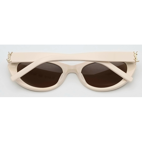 416 - A Pair of Saint Laurent SL M115 Sunglasses in Ivory with Brown Tinted Lenses. Comes with case and bo... 