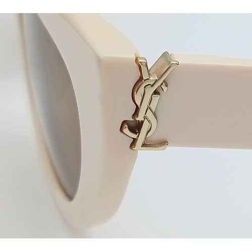 416 - A Pair of Saint Laurent SL M115 Sunglasses in Ivory with Brown Tinted Lenses. Comes with case and bo... 