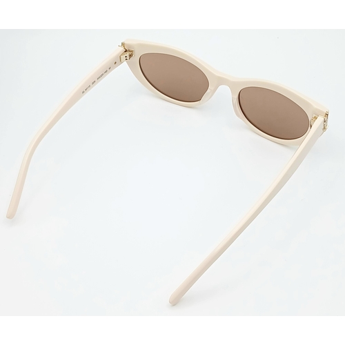 416 - A Pair of Saint Laurent SL M115 Sunglasses in Ivory with Brown Tinted Lenses. Comes with case and bo... 