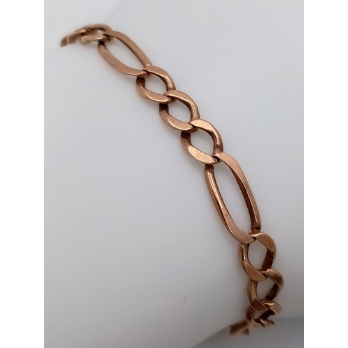 56 - Classic 9 CART GOLD FIGARO LINK BRACELET. 5.23 Grams. Approx 20 cm.