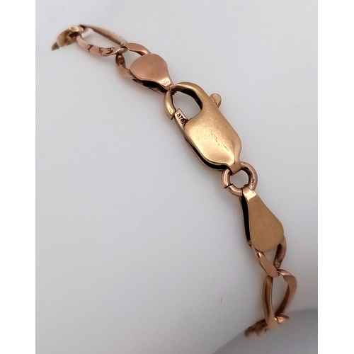 56 - Classic 9 CART GOLD FIGARO LINK BRACELET. 5.23 Grams. Approx 20 cm.