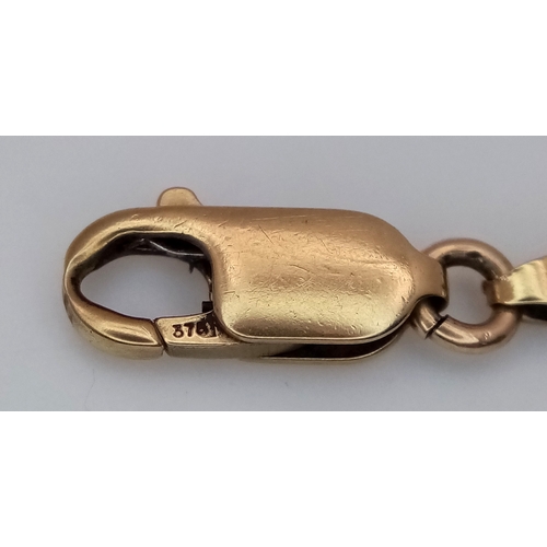 56 - Classic 9 CART GOLD FIGARO LINK BRACELET. 5.23 Grams. Approx 20 cm.