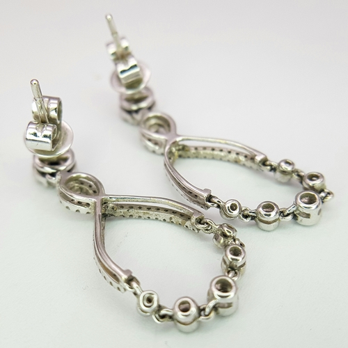48 - A Pair Of 18K White Gold, Diamond Set, Ornate Drop Earrings. 4G. Sc 6056