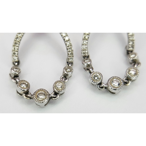 48 - A Pair Of 18K White Gold, Diamond Set, Ornate Drop Earrings. 4G. Sc 6056