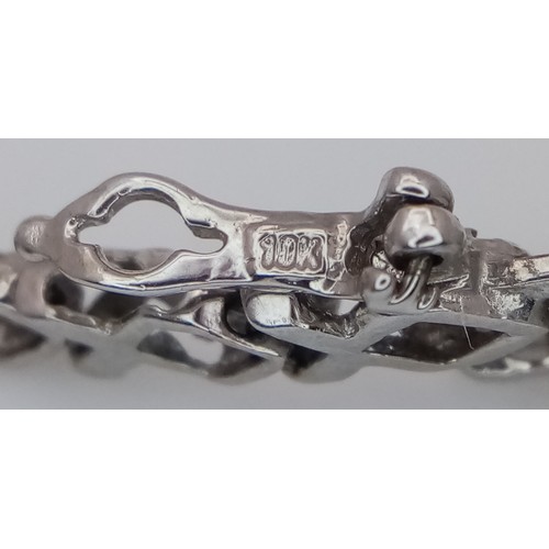 198 - A 9k white gold diamond set bracelet, 0.15ct diamond weight, 6.2g total weight, 18cm total length. R... 