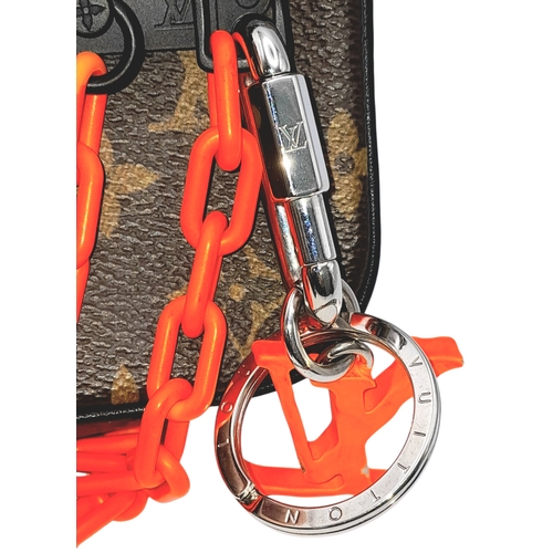 165 - A Brown Louis Vuitton Monogram Pochette with Chain Strap. Brown monogram coated canvas exterior with... 