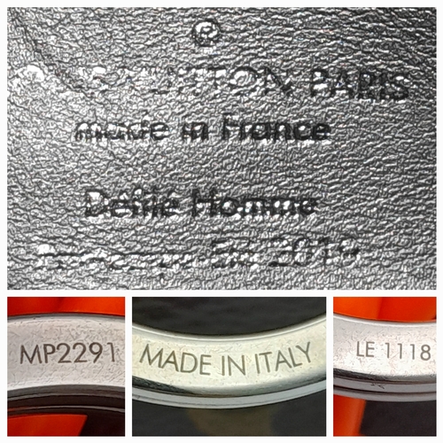 165 - A Brown Louis Vuitton Monogram Pochette with Chain Strap. Brown monogram coated canvas exterior with... 