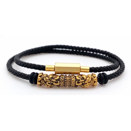179 - A Lao Miao 24K Gold nugget charm Braided Bracelet. Black braided cord with 24K gold decorative barre... 